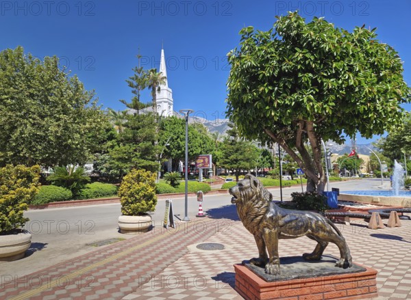 KEMER, TURKEY - JULY 5, 2025 Kemer Saat Kulesi today Cafe Mokka in the city centrum, with view from