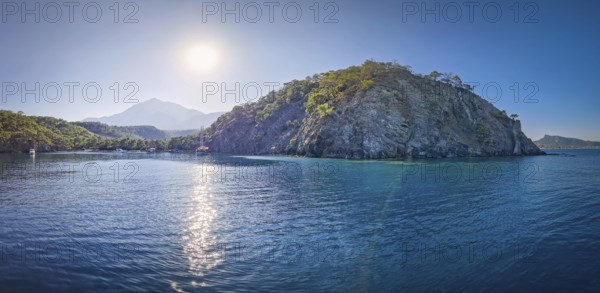 Wonderful Paradise bay of Camyuva, Kemer, Turkey. Scenery sea view to the coast with boats on the