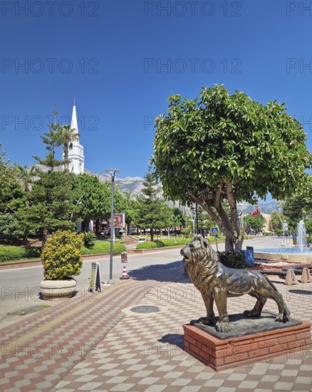 KEMER, TURKEY - JULY 5, 2025 Kemer Saat Kulesi today Cafe Mokka in the city centrum, with view from