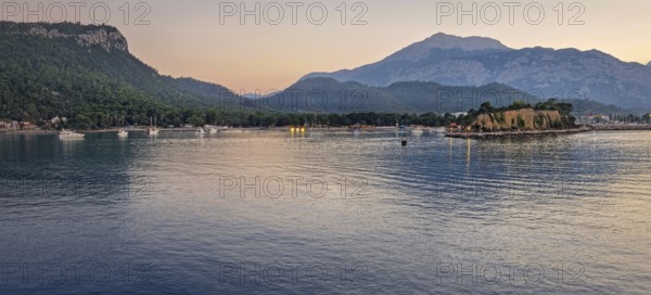 Seascape sunset panorama over the Mediterranean Sea near Kemer, Turkey. Panoramic view to the