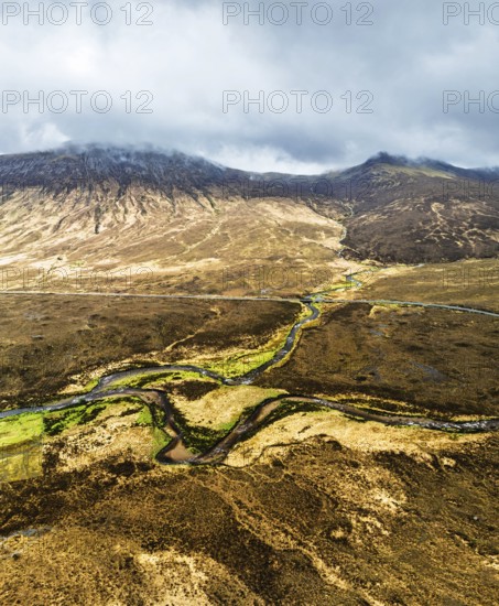 Panorama of Eas a' Bhradain Waterfall from drone, Red Cuillin mountains, Loch Ainort, Isle of Skye,