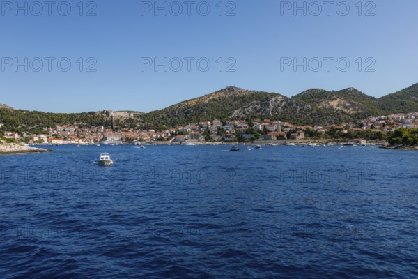 View from the sea to the harbour and the town of Hvar, panoramic view, island of Hvar, Dalmatia,