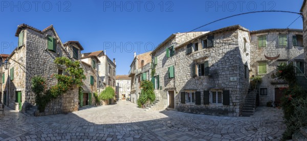 Trg Skor, Skor Square, panoramic view, stone houses in the old town centre, Starigrad, island of