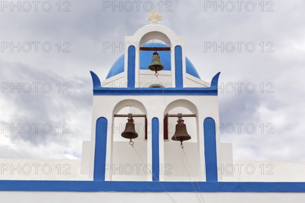 Blue and white bell tower, Mikros Profitis Ilias church, hiking trail from Fira to Oia, Thira,