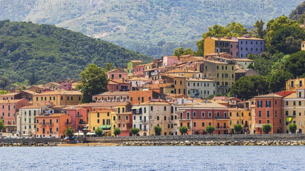 The village of Rio Marina with its pastel-coloured house facades, Elba Island, Tuscan Archipelago