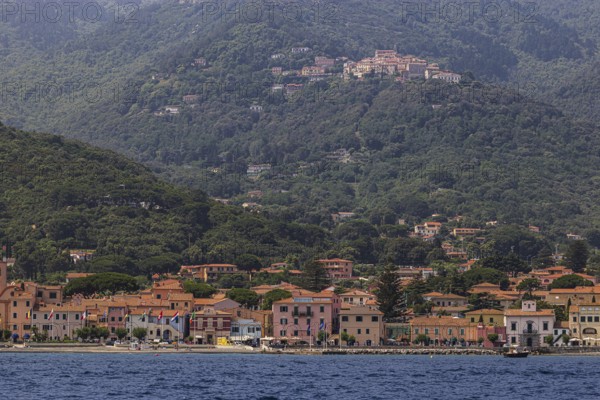 The harbour of Marziana Marina, behind the mountain village of Poggio, Elba Island, Tuscan