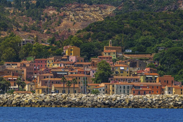 The village of Rio Marina with its pastel-coloured house facades, Elba Island, Tuscan Archipelago
