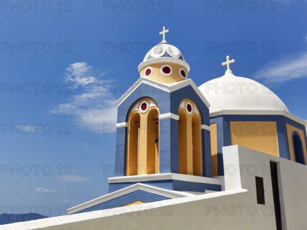 Catholic Church of Saint Stylianos, colourful facade, domes, Fira, Thira, Santorini, Cyclades,