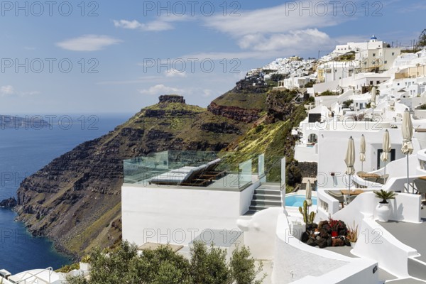 Sun terrace and white holiday homes, cliffs, caldera, Skaros rock formation, Firostefani, Thira,