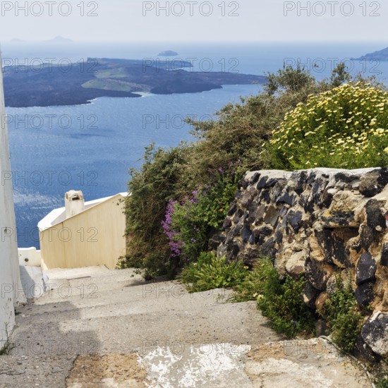 Hiking trail from Fira to Imerovigli, view of the caldera and the sea, Thira, Santorini, Cyclades,