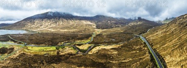 Panorama of Eas a' Bhradain Waterfall from drone, Red Cuillin mountains, Loch Ainort, Isle of Skye,