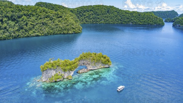 Aerial view bird's eye view of rock arch Natural Arch in lagoon of in island paradise island state