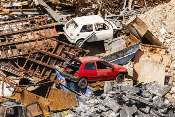 Scrap metal trade in the commercial harbour of Mannheim. Scrap vehicles and scrap metal. Mannheim,