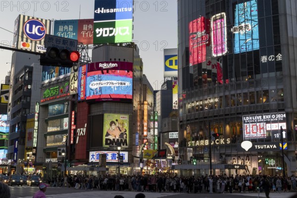 Crowd waiting at the zebra crossing of Shibuya Crossing, world-famous intersection in Shibuya