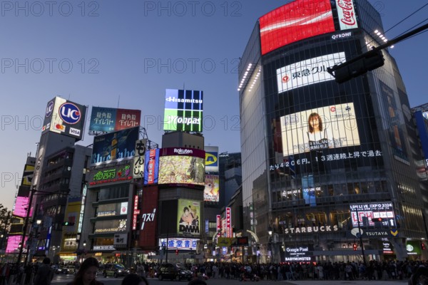Crowd waiting at the zebra crossing of Shibuya Crossing, world-famous intersection in Shibuya