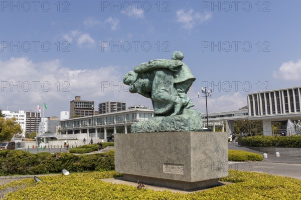 Statue of mother and children in the storm, bronze statue by the artist Shin Hongo in front of the