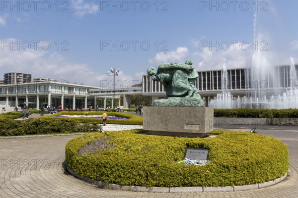 Statue of Mother and Children in the Storm, bronze statue by artist Shin Hongo and Fountain of