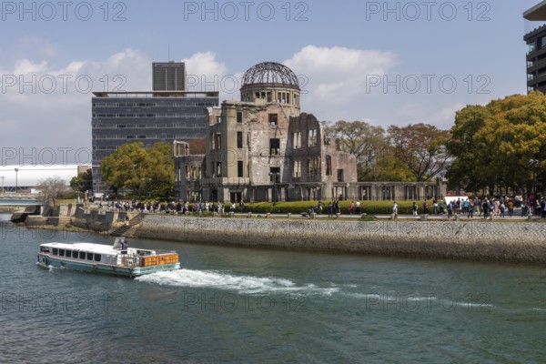 Excursion boat and atomic bomb dome, Atomic Bomb Dome, ruins of the former Chamber of Commerce and