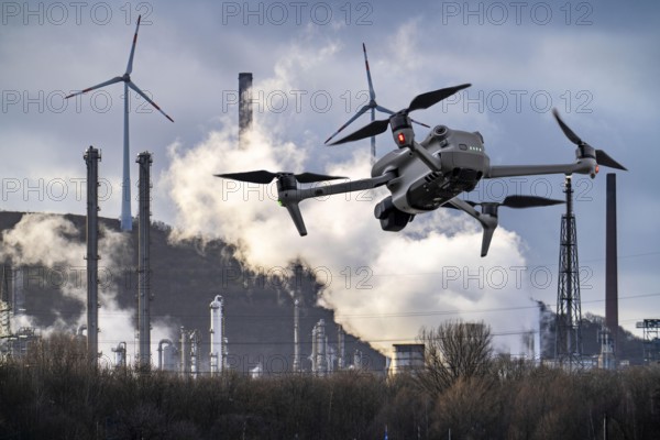 Symbolic image, photomontage, reconnaissance, spying with drones in industrial plants, critical