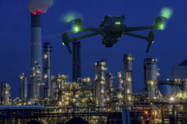 Symbolic image, photomontage, reconnaissance, spying with drones in industrial plants, critical