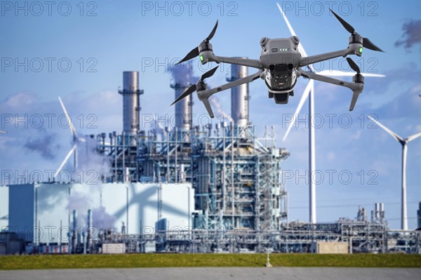 Symbolic image, photomontage, reconnaissance, spying with drones in industrial plants, critical