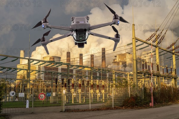 Symbolic image, photomontage, reconnaissance, spying with drones in industrial plants, critical