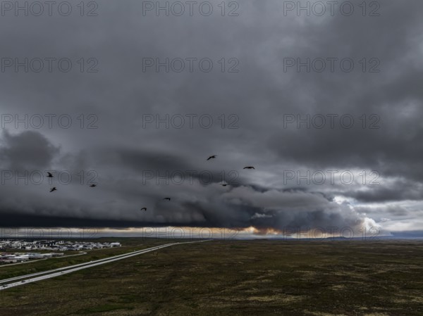 Volcano, volcanic eruption, ash cloud, road, village, aerial view, Sundhnúkur crater chain, July