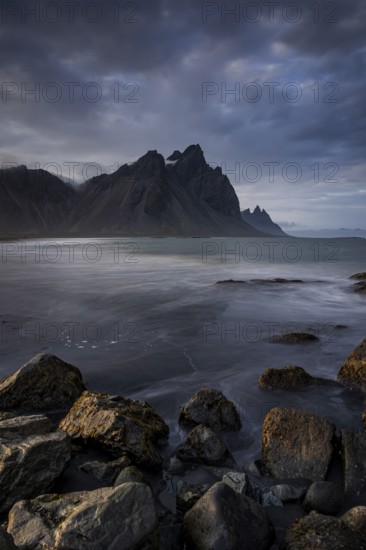 Mountains, mountain range, beach, sea, waves, surf, reflection, clouds, evening light, coast,