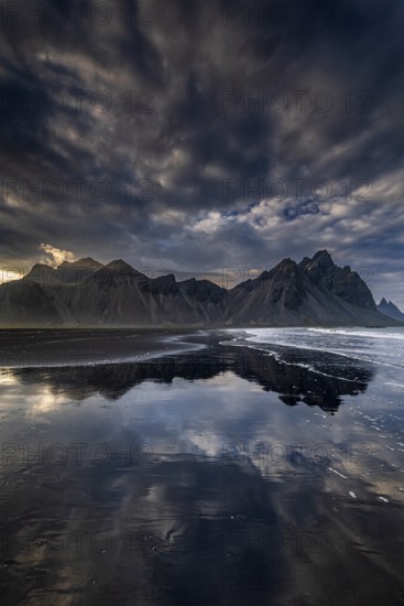Mountains, mountain range, beach, sea, waves, surf, reflection, clouds, evening light, coast,