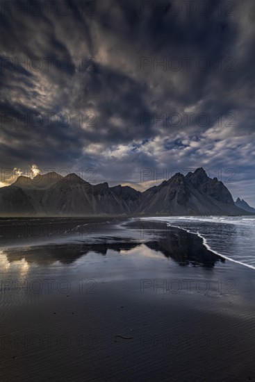 Mountains, mountain range, beach, sea, waves, surf, reflection, clouds, evening light, coast,