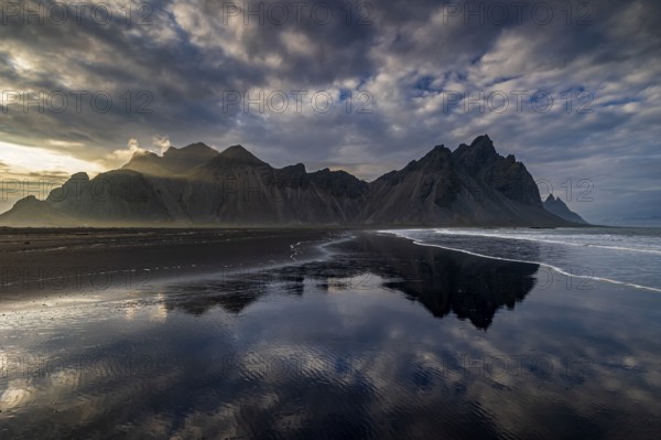 Mountains, mountain range, beach, sea, waves, surf, reflection, clouds, evening light, coast,
