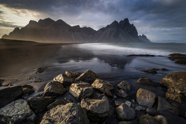Mountains, mountain range, beach, sea, waves, surf, reflection, clouds, evening light, coast,
