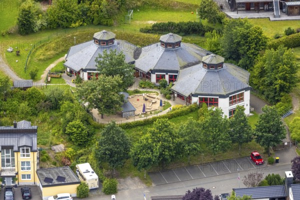 Aerial view, AWO Family Centre Laubfrosch Kindergarten, octagonal building and playground, Bad