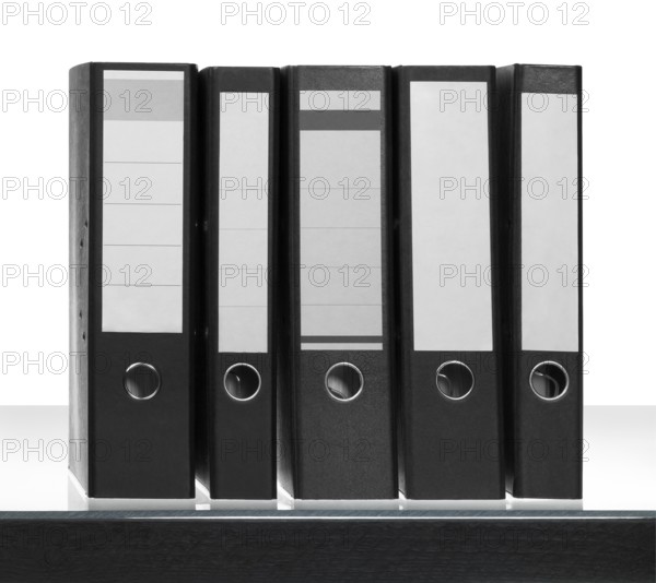 Some Folders on desk surface in white back