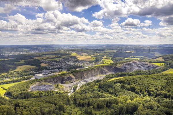 Aerial view, quarry Ebel Steinbruchbetriebe Werk Habbel, distant view and blue sky with clouds,