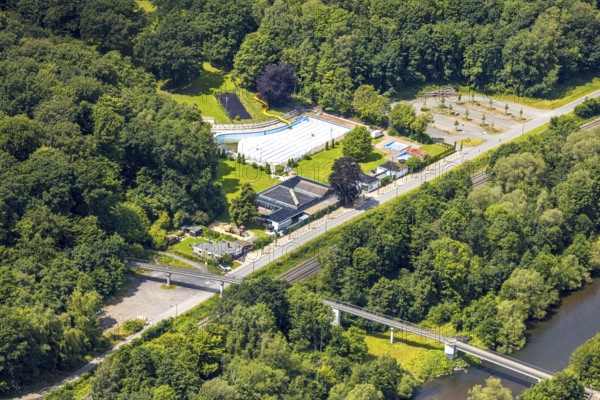 Aerial view, outdoor swimming pool Neheim, swimming pool without water, in the forest area at the