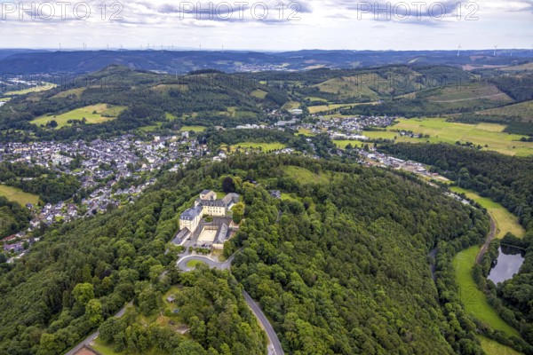 Aerial view, Wittgenstein Castle, view over Bad Laasphe with hilly landscape and distant view,