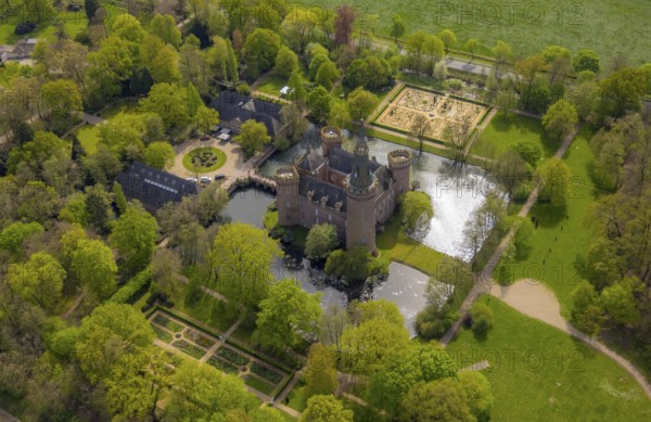 Aerial view, Museum Schloss Moyland, neo-Gothic moated castle and castle park surrounded by meadows