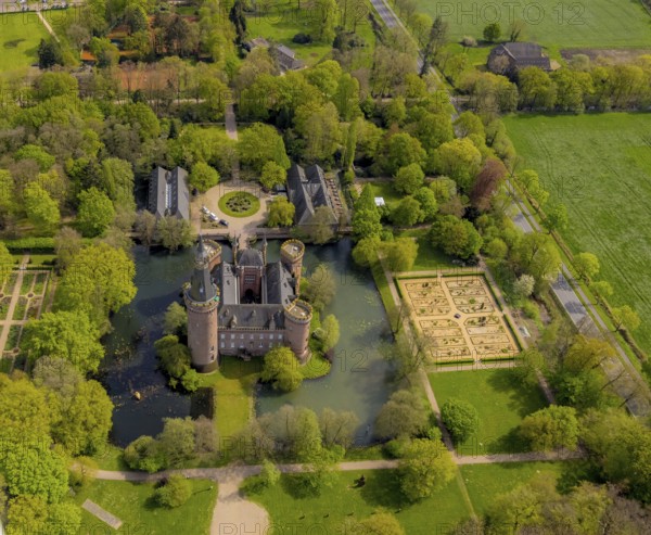 Aerial view, Museum Schloss Moyland, neo-Gothic moated castle and castle park surrounded by meadows