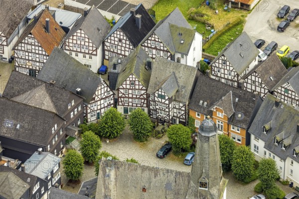 Aerial view, spire of the protestant town church and church square in the town centre with historic