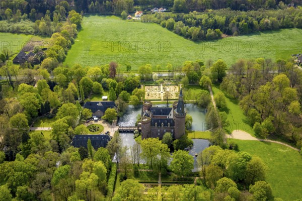Aerial view, Museum Schloss Moyland, neo-Gothic moated castle and castle park surrounded by meadows