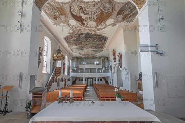 Interior of the Roman Catholic parish church of the Assumption of the Virgin Mary with organ loft