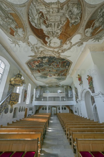 Interior of the Roman Catholic parish church of the Assumption of the Virgin Mary with organ loft