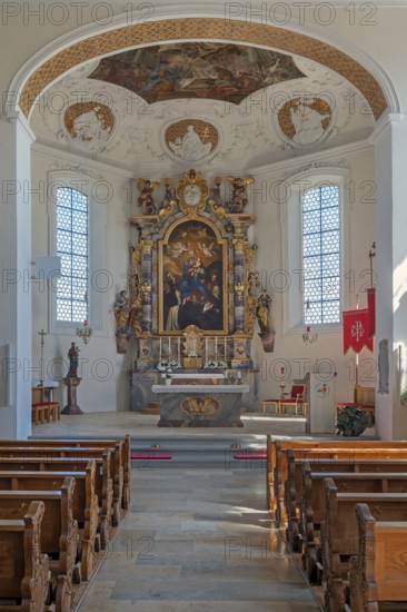 Interior of the Roman Catholic parish church of the Assumption of the Virgin Mary, main altar with
