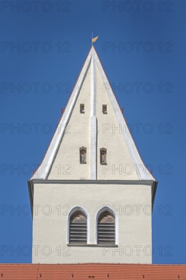 Pointed gable tower of the Roman Catholic parish church of the Assumption of the Virgin Mary in