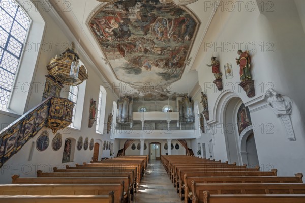 Interior of the Roman Catholic parish church of the Assumption of the Virgin Mary with organ loft