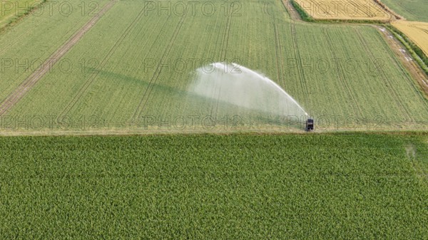 Irrigation system watering soybeans during springtime in the fertile Po Valley region of Northern