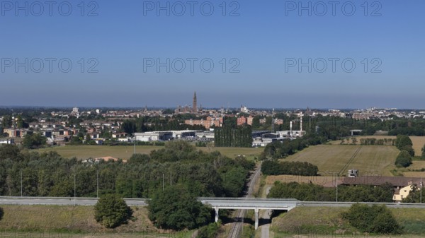 Panoramic view of Cremona skyline and agricultural landscape near a Northern Italian city under a