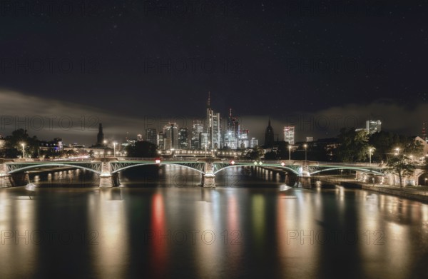 Frankfurt skyline, Main bridge and river at night under the stars, city centre, Frankfurt am Main,
