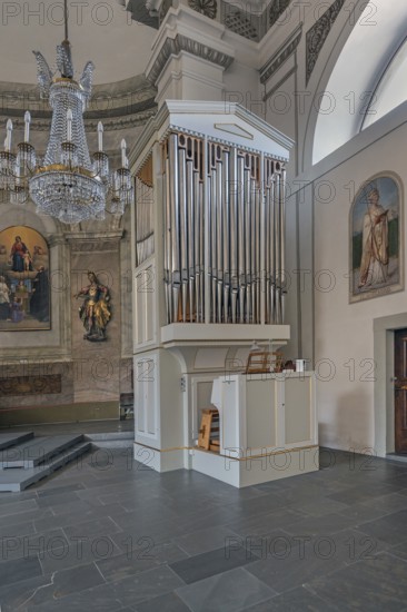 The Roman Catholic parish church of St Martin, interior with side organ, wall frescoes and crystal